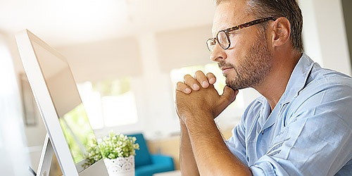 man on a computer